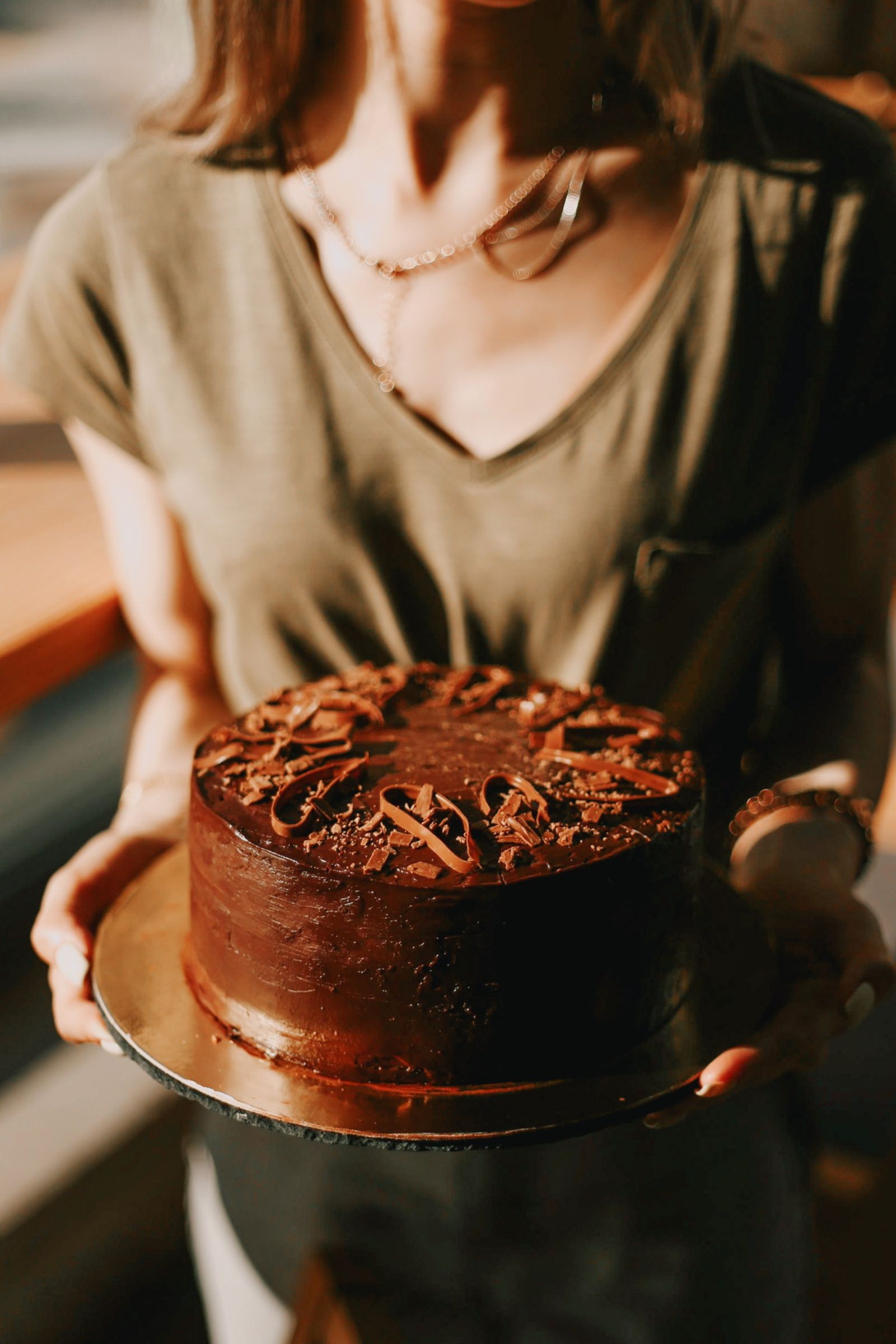 Rich chocolate cake on a cake stand